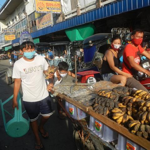 market visitors wearing masks